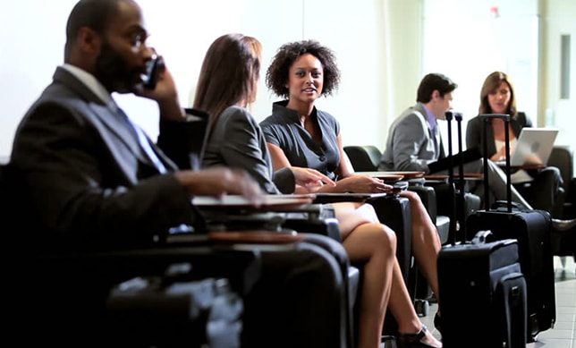 Show working executive or having meeting in Lounge.